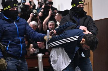 Далержон Мирзоев, задержанный по подозрению в террористическом акте в "Крокус Сити Холл", в здании Басманного суда Москвы, 24 марта 2024