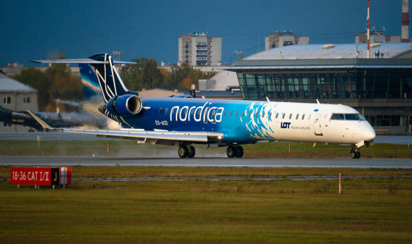 Самолет эстонской авиакомпании Nordica Bombardier Самолет эстонской авиакомпании Nordica Bombardier